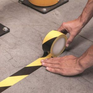 rollo cinta adhesiva amarillo negro